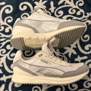 Puma Women's Metallic Silver and White Sneakers